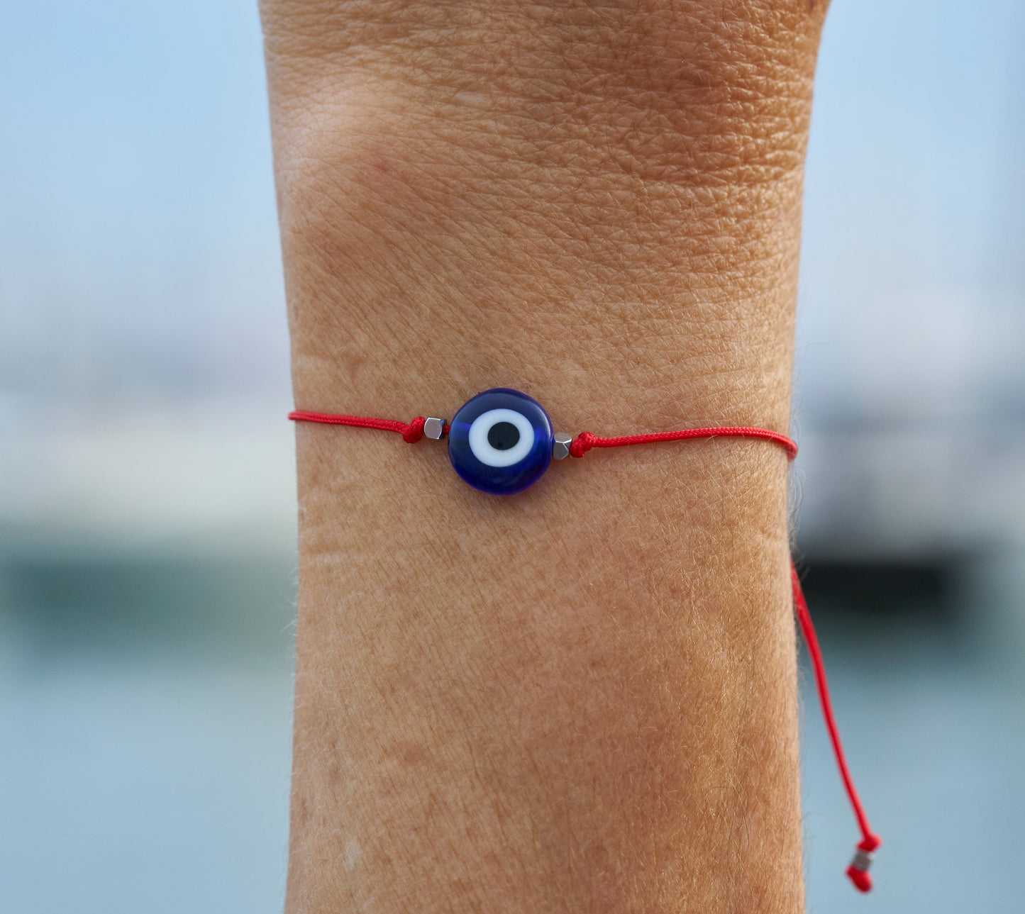 Pulsera de hilo rojo con ojo turco. Pulsera de protección.