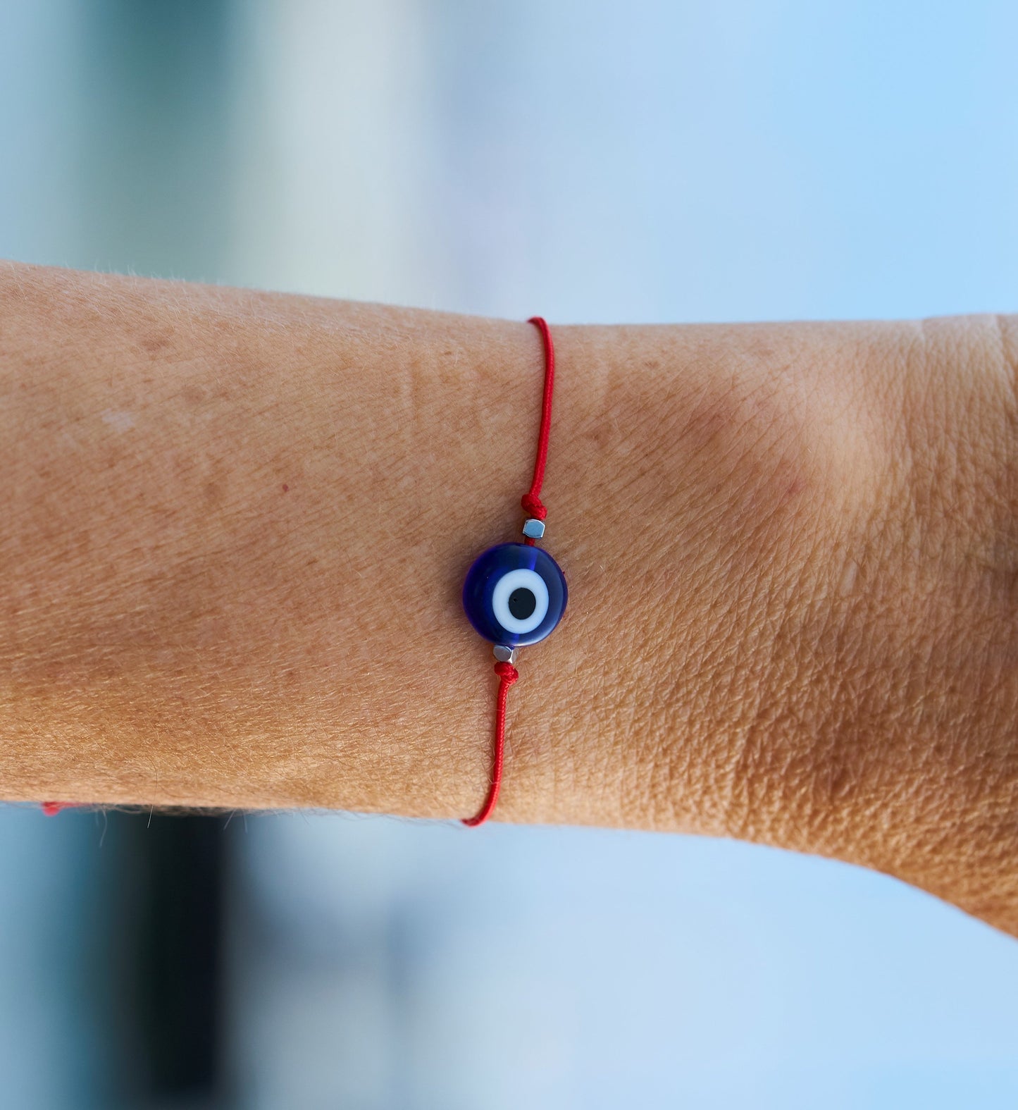 Pulsera de hilo rojo con ojo turco. Pulsera de protección.